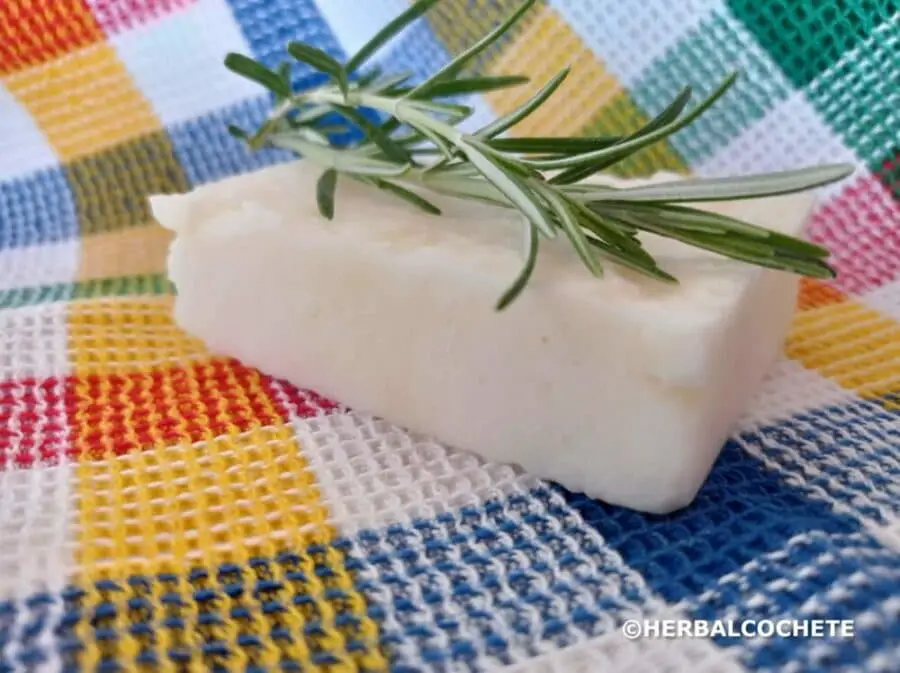 homemade syndet shampoo bar decorated and scented with rosemary