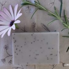 purple rosemary and lavender soap with poppy seeds with flower decoration