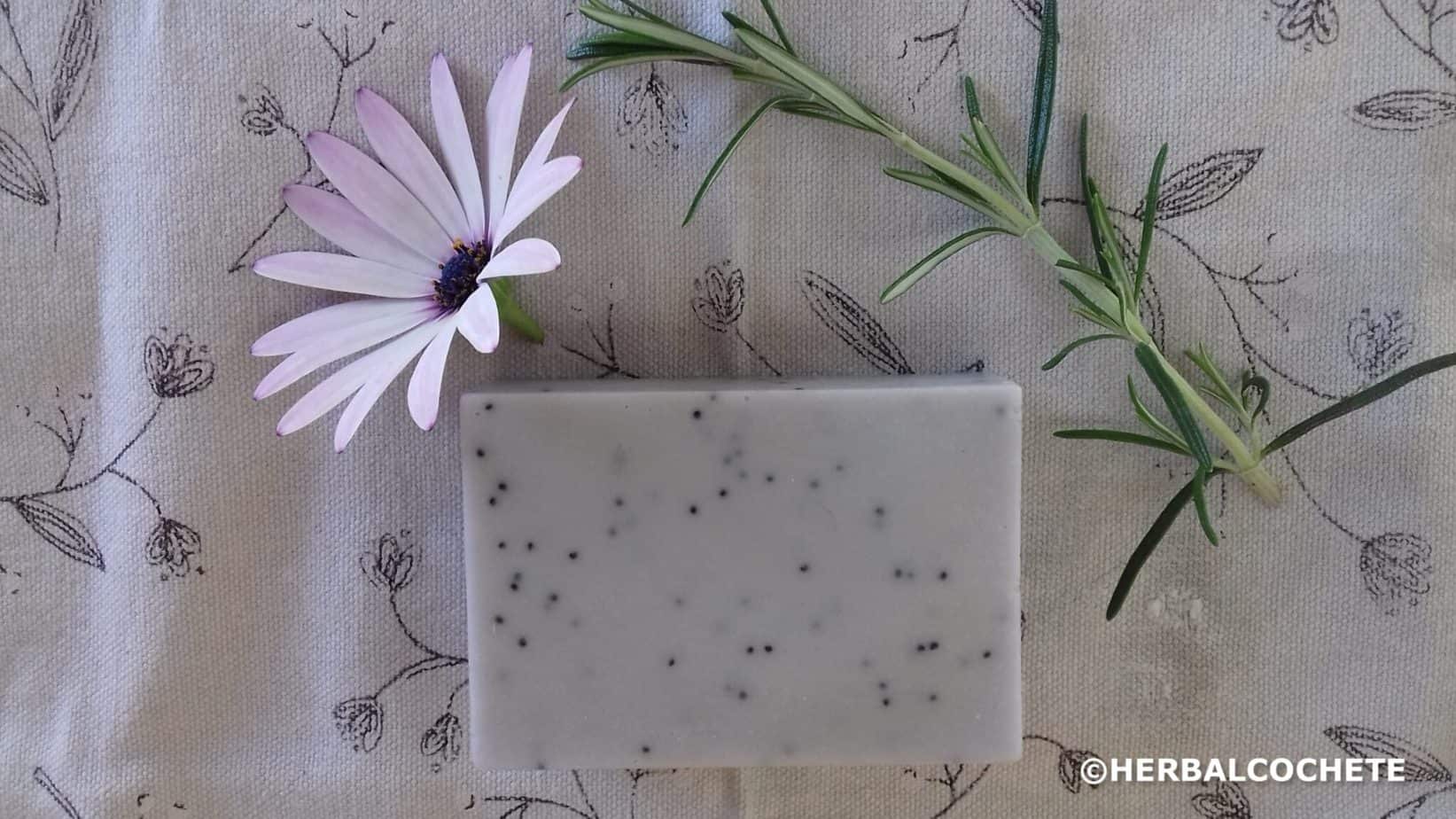 purple rosemary and lavender soap with poppy seeds with flower decoration