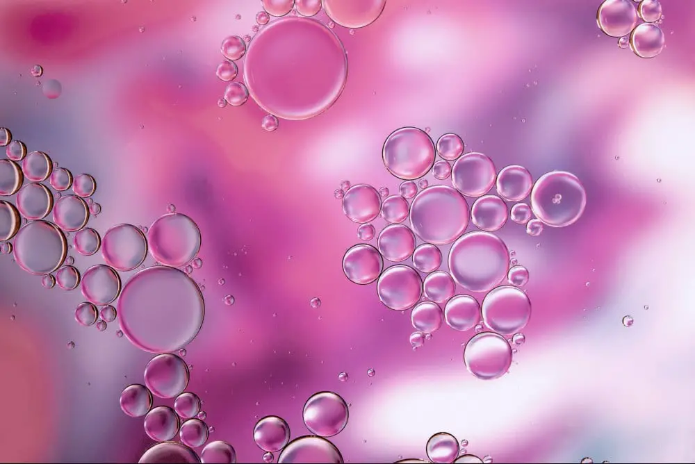 liquid pink soap with bubbles