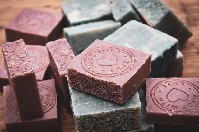colorful soap bars stamped with "made with love"
